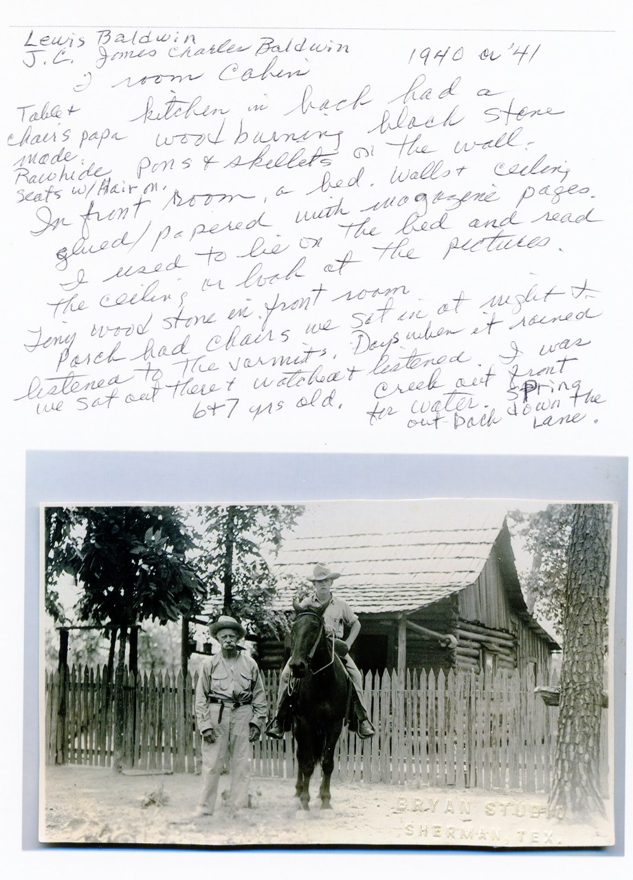 Two men posed with a horse in front of wooden ranch buildings and whitewashed fence, circa 1940.